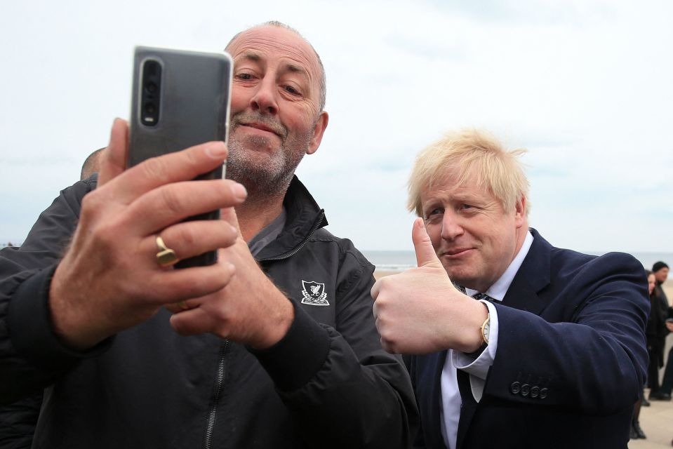 Boris johnson stopped for selfies with passers by