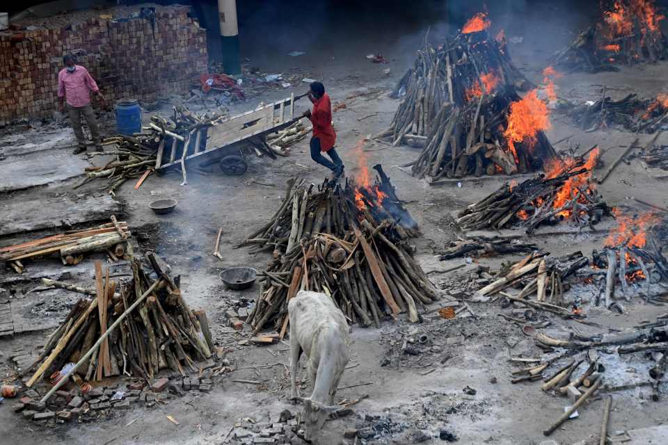 Crematoriums have become overwhelmed by the number of Covid deaths in India