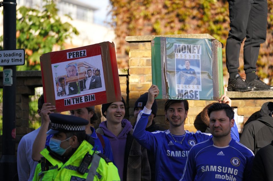 And supporters held up signs and chanted obscenities about Real Madrid president Florentino Perez