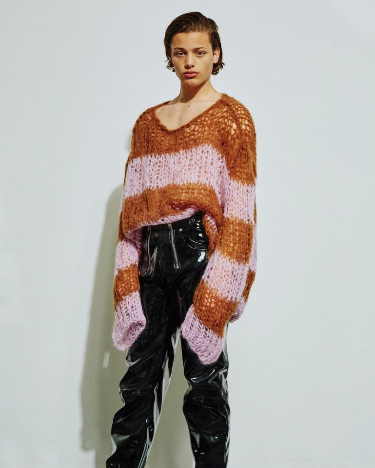 One look consisted of an oversized knitted jumper and some black PVC trousers