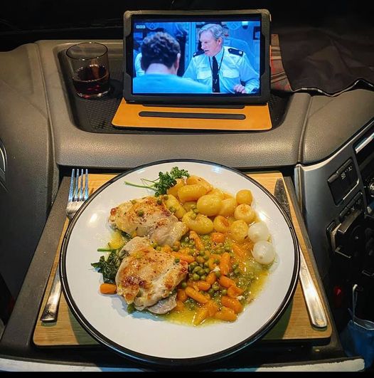 Chris can tuck into a nice evening meal while resting and watching a show