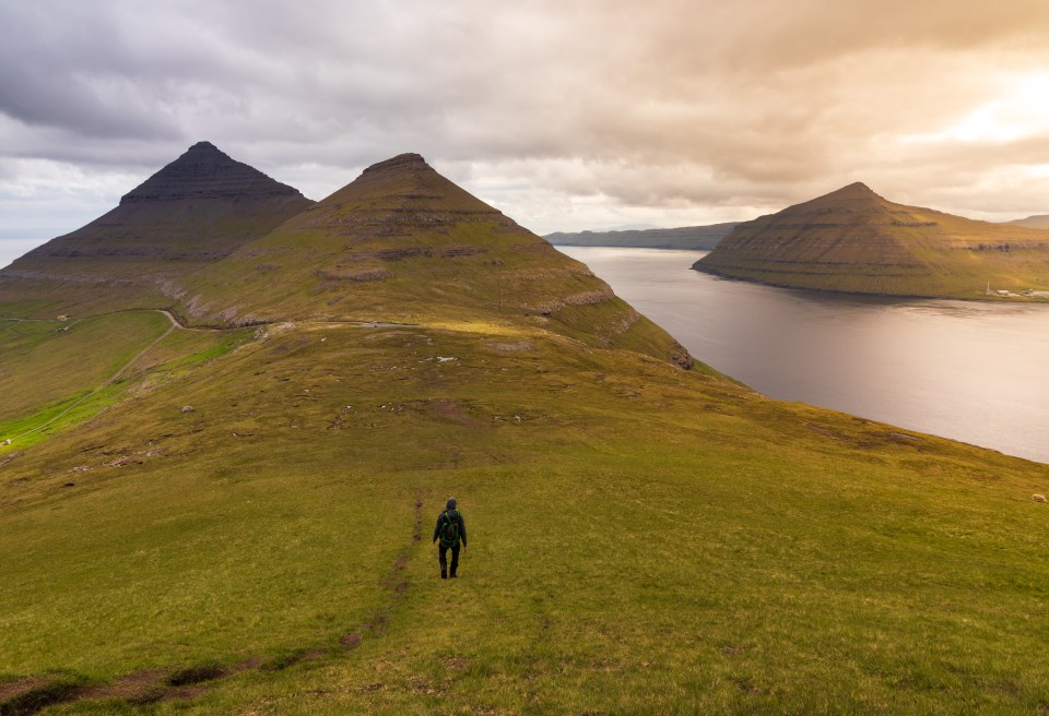 Klaksvik is a walk up a hill is rewarded with staggeringly beautiful panoramic views of deep-green mountains, violently vertical cliffs and nearby islands