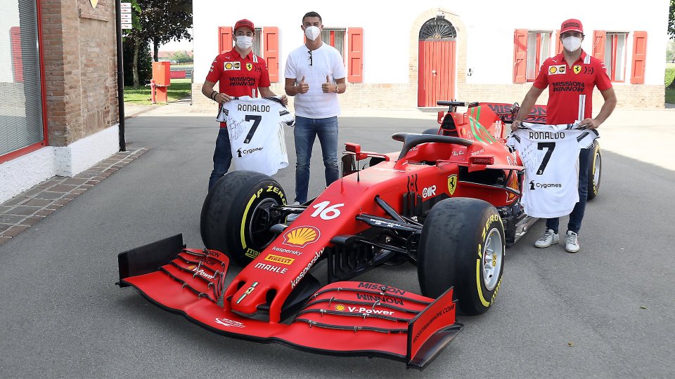 Cristiano Ronaldo posed for a photo with Ferrari's F1 drivers Charles Leclerc and Carlos Sainz during his visit to Maranello