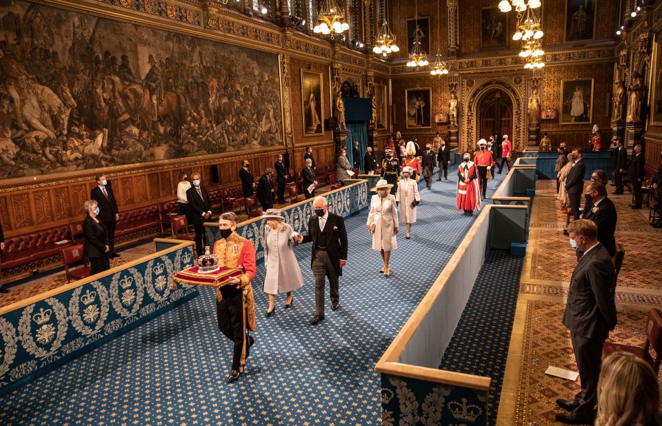 The royals process through the Palace of Westminster