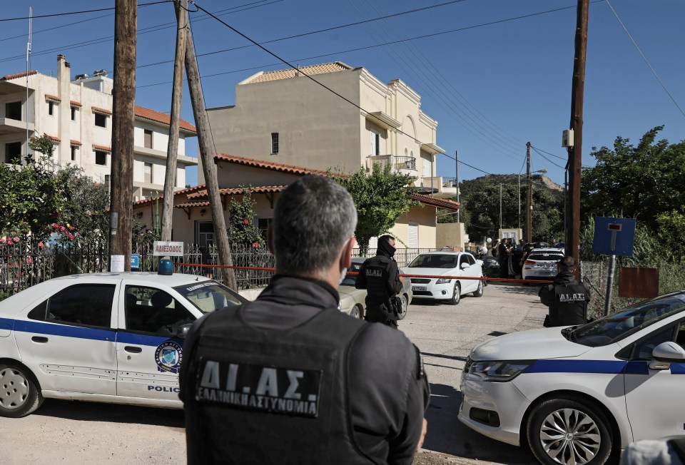 Police at the scene of the murder in a suburb of Athens