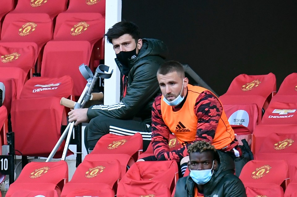 Maguire watched the second half of the Leicester defeat from the stands - with crutches