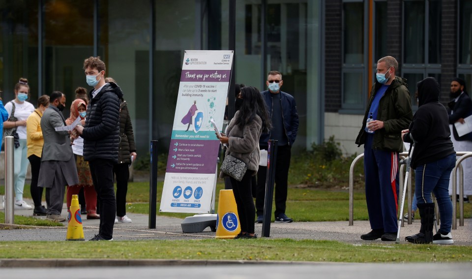 Mobile vaccination centres have been set up in Bolton - one of the areas worst affected