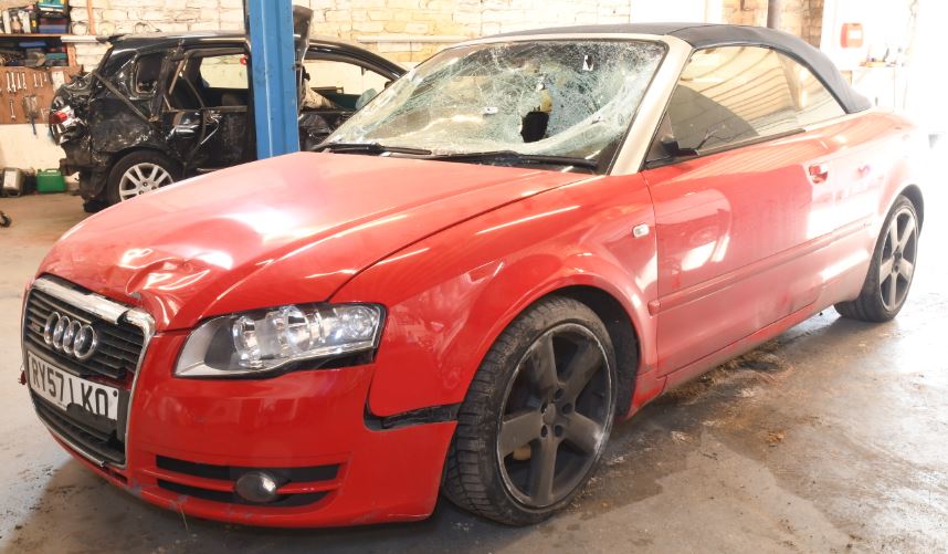 His smashed up Audi A4 convertible was found at Wrigglesworth's home after he drove off