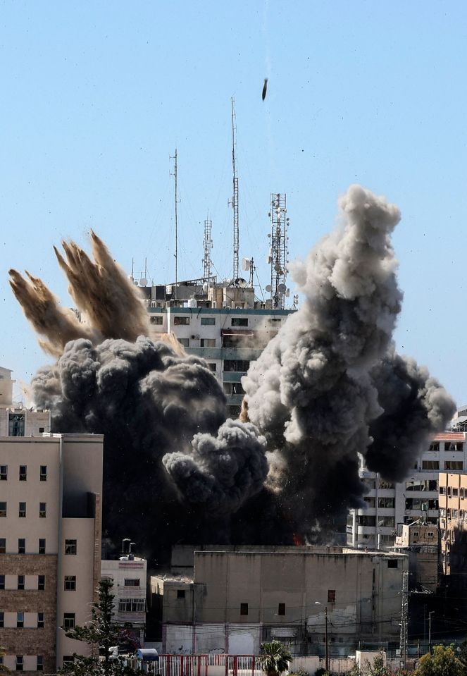 An Israeli air strike destroyed a high-rise building in Palestine’s Gaza City