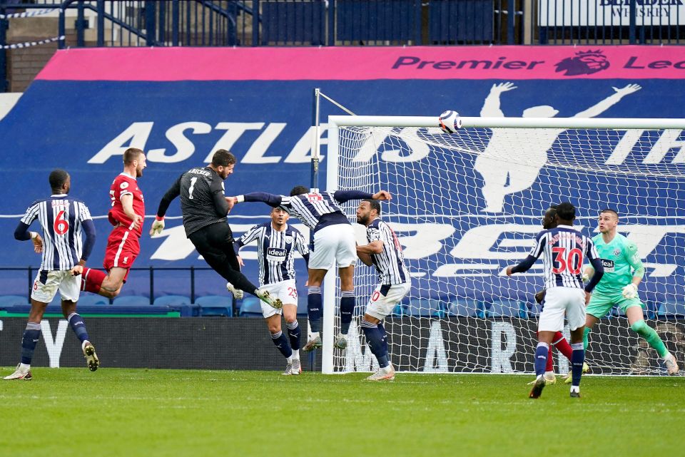 Alisson Becker produced a striker's finish from the late corner