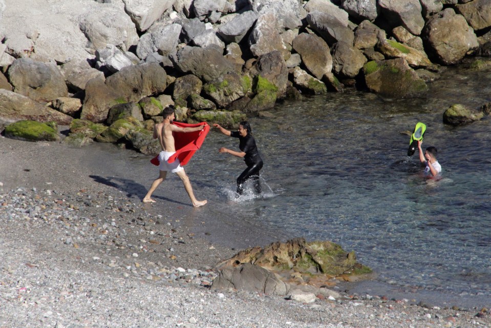 A woman arriving ashore in the enclave