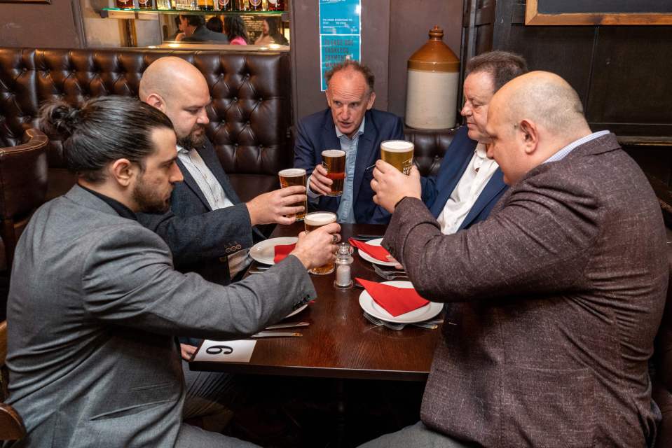 Drinkers enjoying their first indoor pints since November