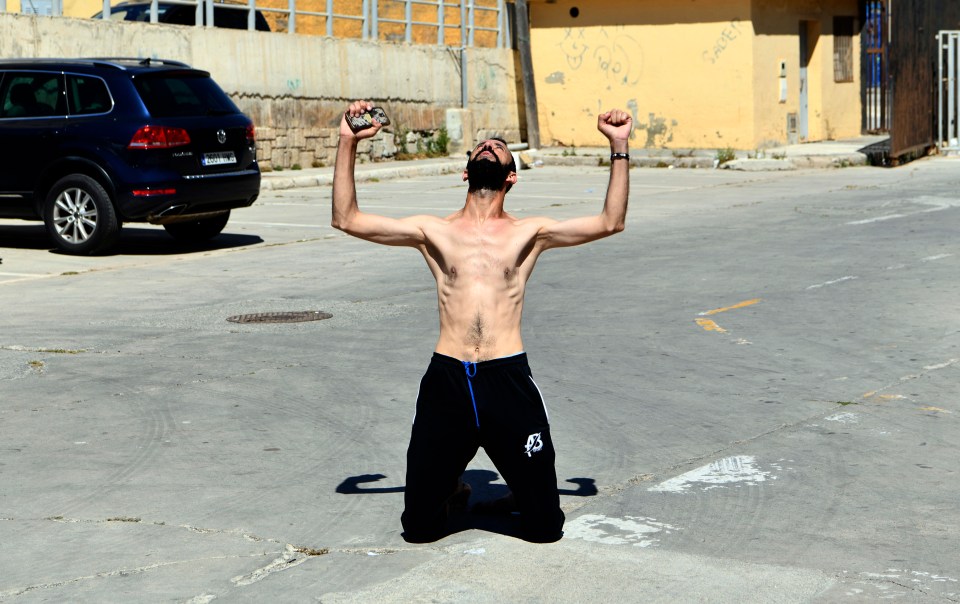 One man celebrates after making it into Ceuta, an EU enclave in north Africa