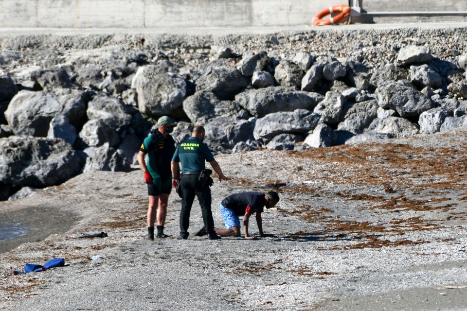 One exhausted man on the beach