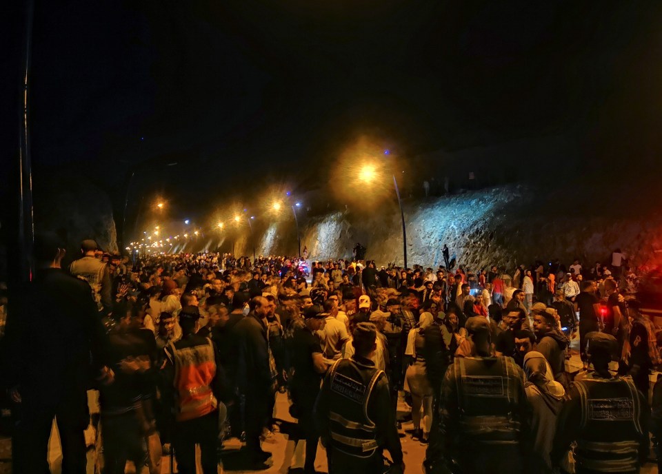 Hundreds waiting their turn to cross into Spain from the town of Fnideq, Morocco, last night