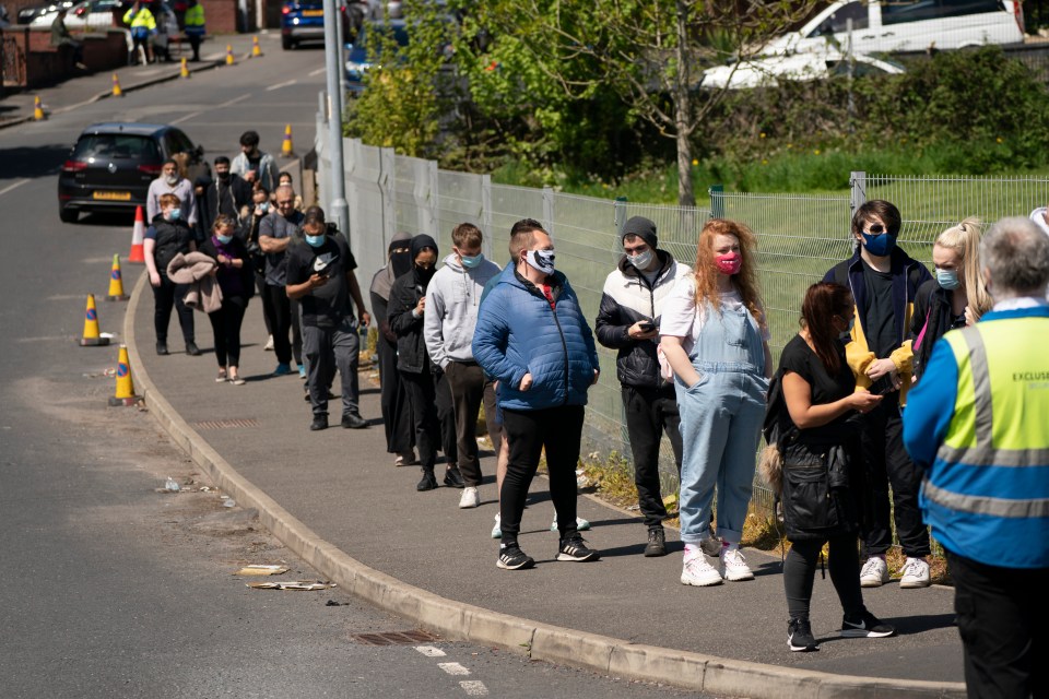 Locals queuing to get vaccines in Bolton after a rise in variant cases