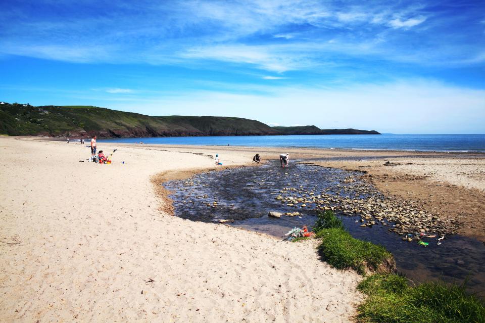 A wide sweep of sand backed by dunes and boasting views of the Bristol Channel