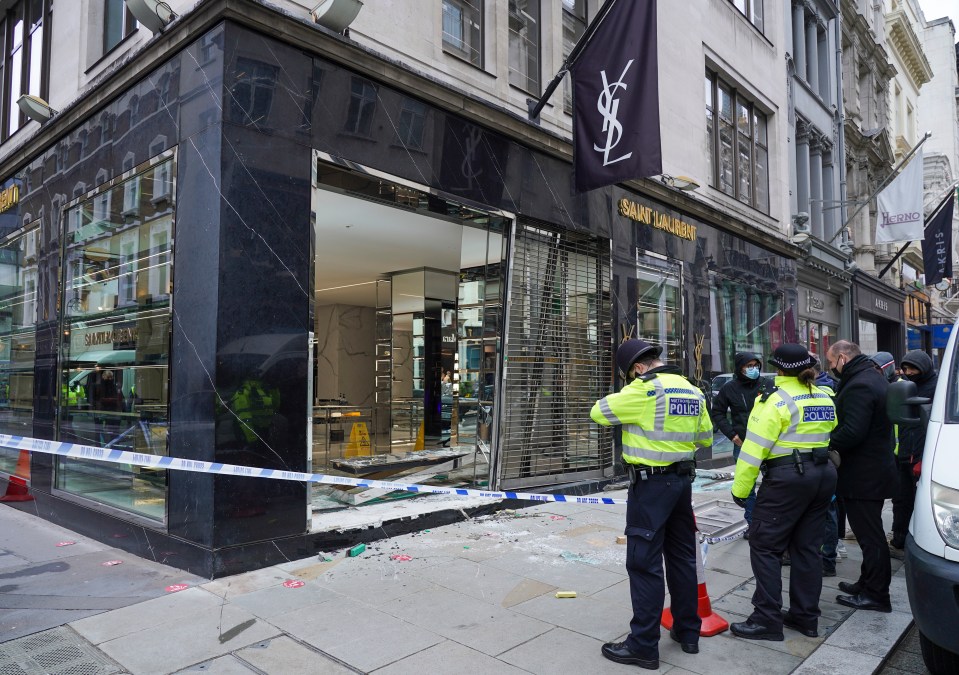 Ram-raiders smashed into Yves Saint Laurent store in London's Old Bond Street and nicked handbags worth £70,000