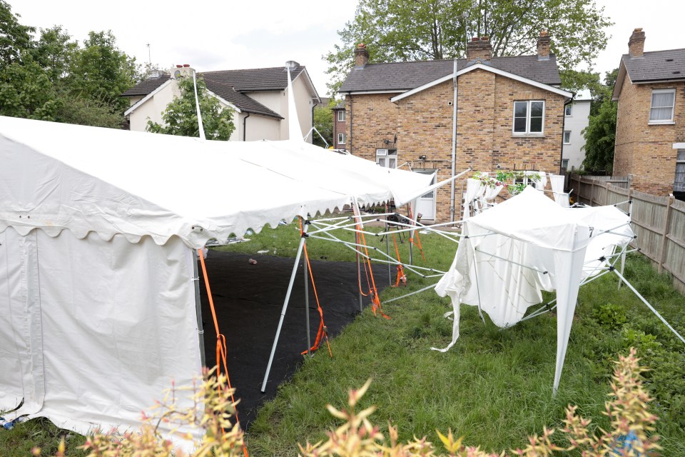 A tent in a garden where the shooting unfolded