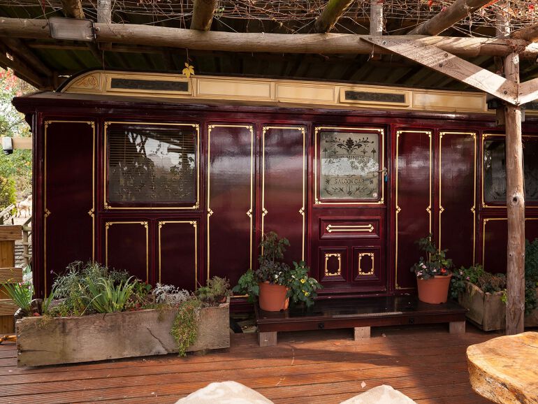 This train carriage is in the Sussex countryside