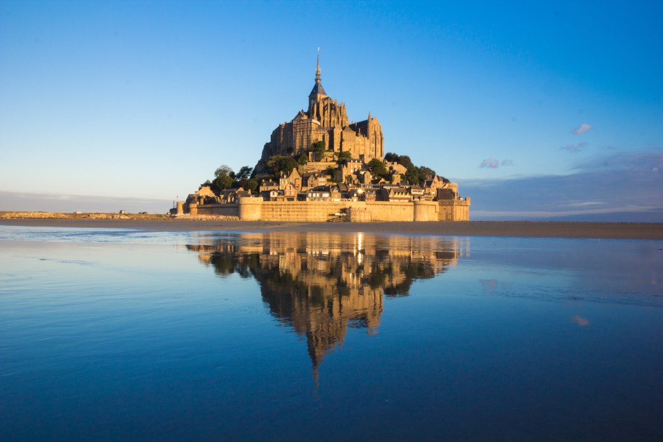 Mont-Saint-Michel in Normandy, a castle on an island, is the French counterpart of the Cornish gem