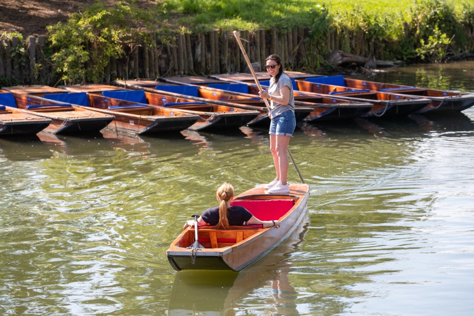 People enjoying the sunshine in Cambridge