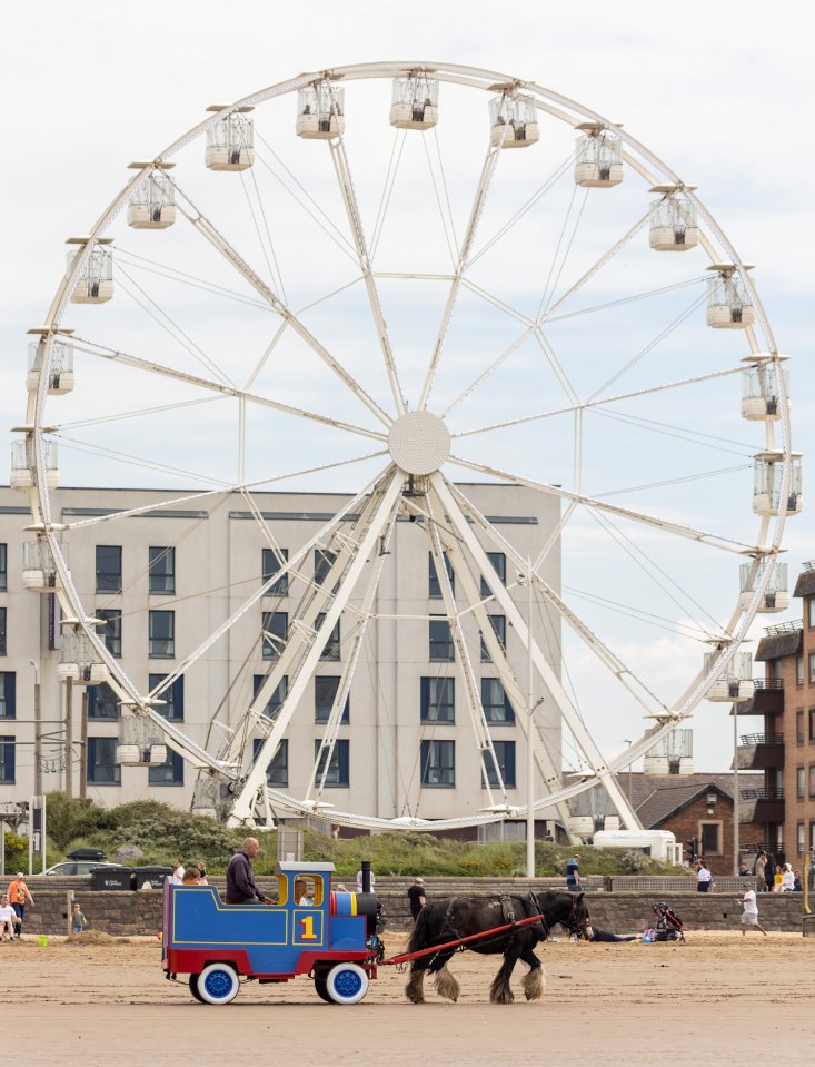 People enjoy the hotter weather on Weston-super-Mare beach