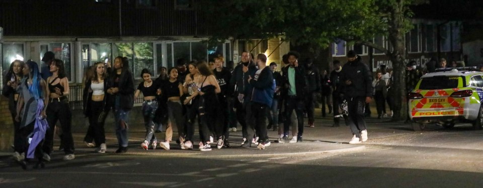 Hoards of people spilled out into the street after police shut the rave down at 2.30am