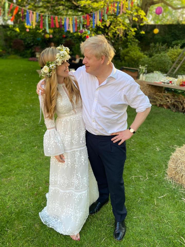 The beaming couple after their secret ceremony