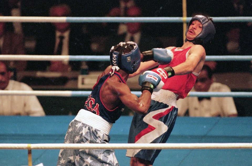 Mayweather goes after Serafim Todorov at the Olympics