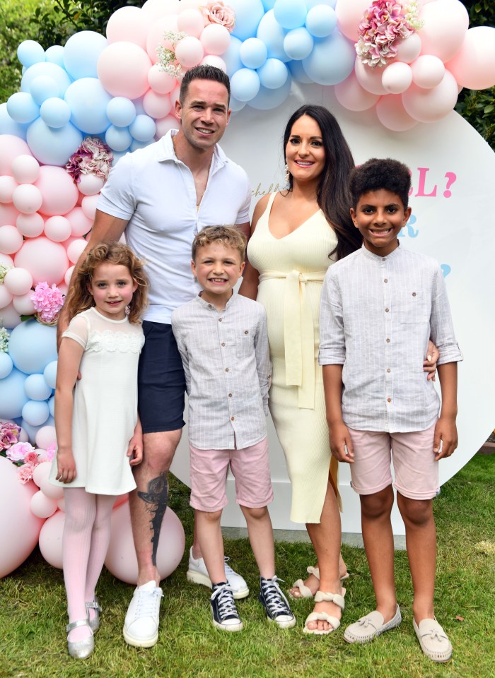 The couple were joined by their three kids for the big reveal