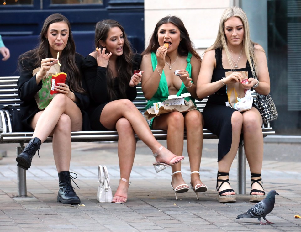 One group perched on a bench and enjoyed a McDonald’s after a boozy night