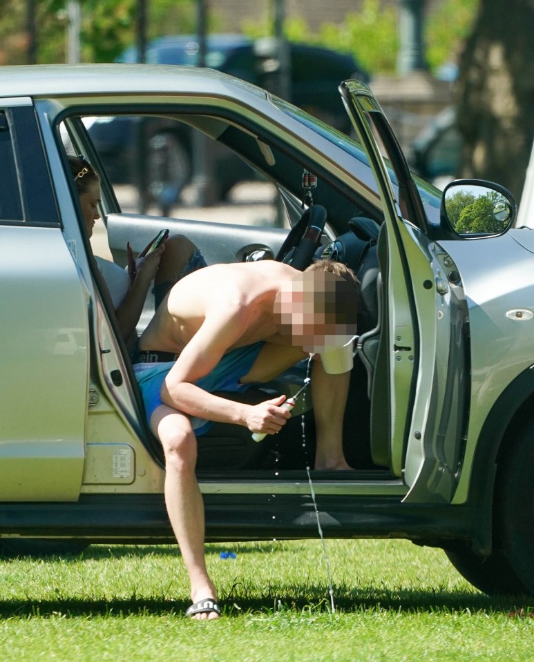 The group showed no signs of leaving as they basked in the scorching 24C temperatures