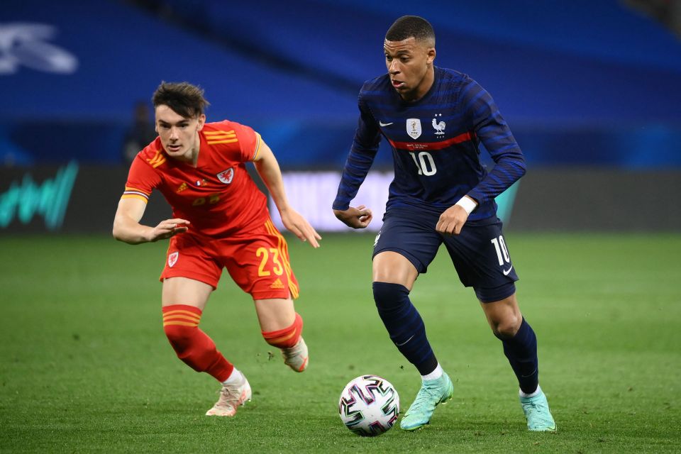 Levitt tries to get close to Kylian Mbappe