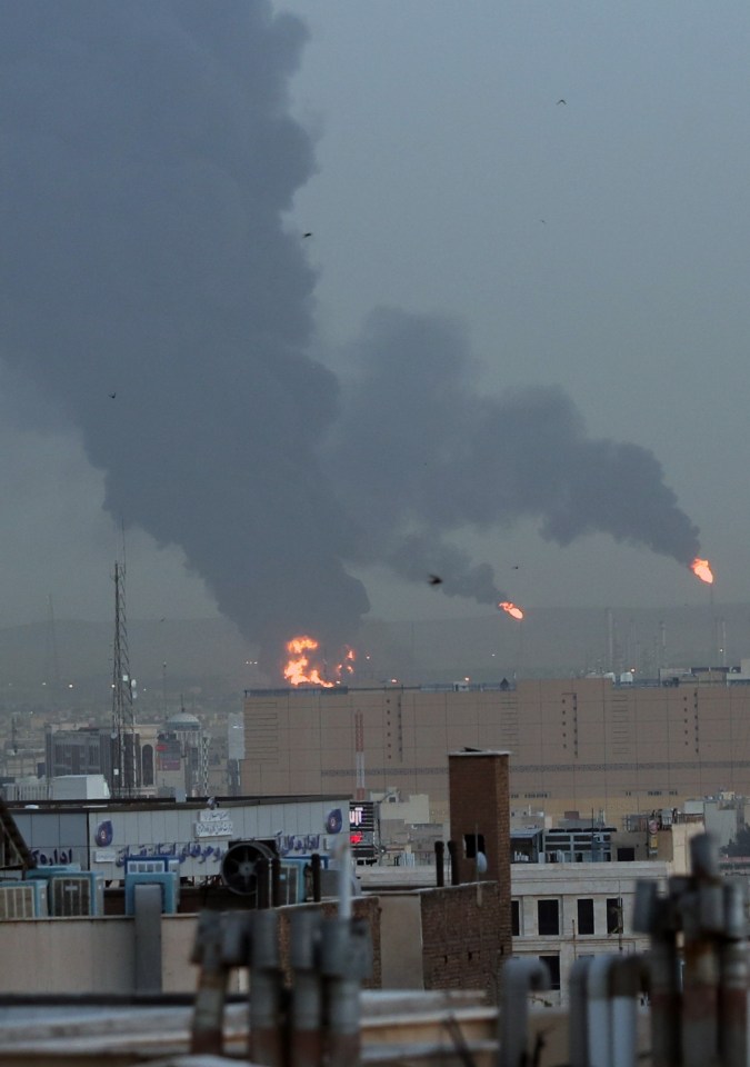 Smoke rises after a fire broke out at Tondgooyan Oil Refinery in Tehran