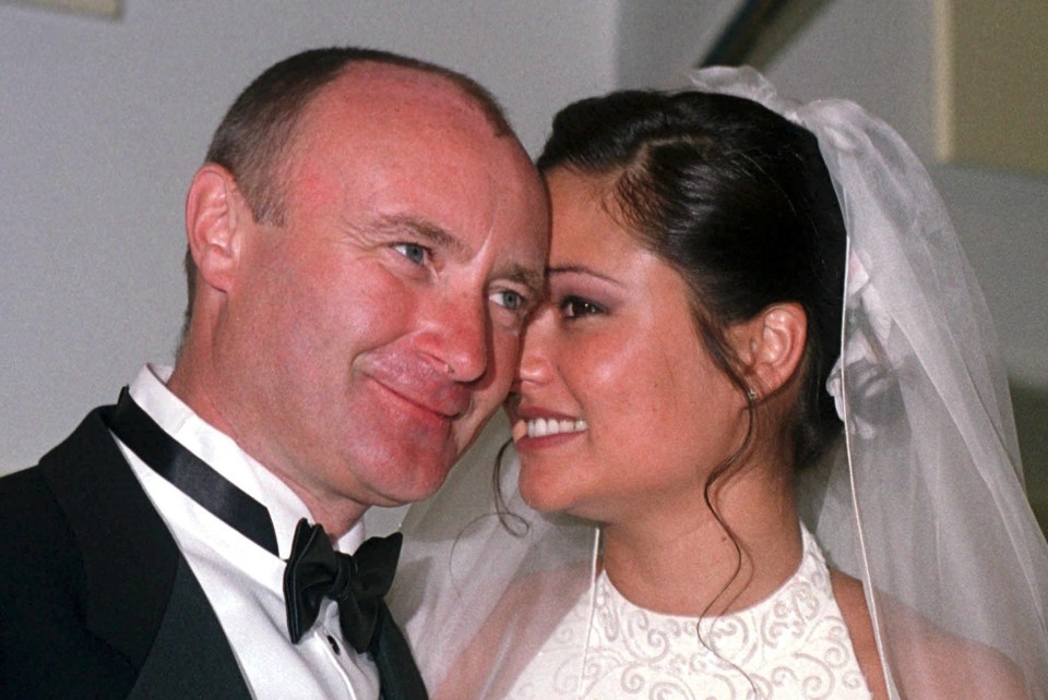 Collins and Orianne pose after their wedding in July, 1999