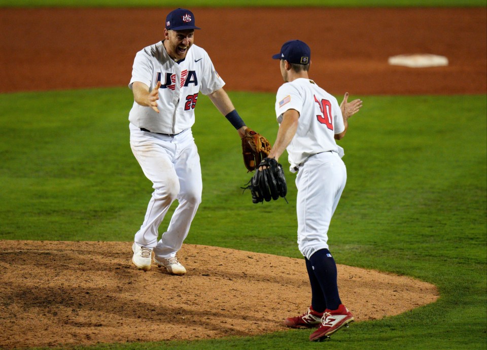 Todd Frazier and David Robertson of the USA