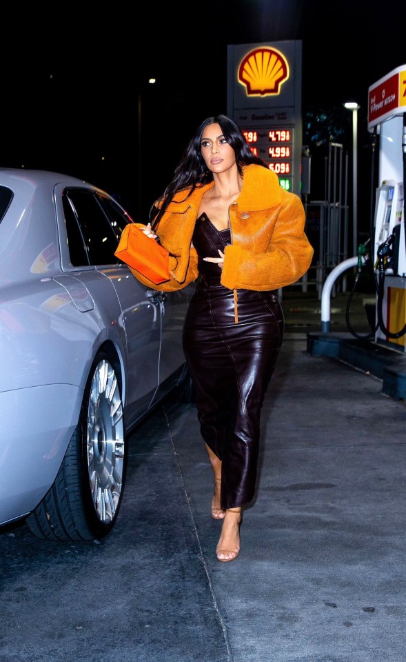 Kim Kardashian wore a bright orange jacket from her estranged husband Kanye West’s Yeezy designer label