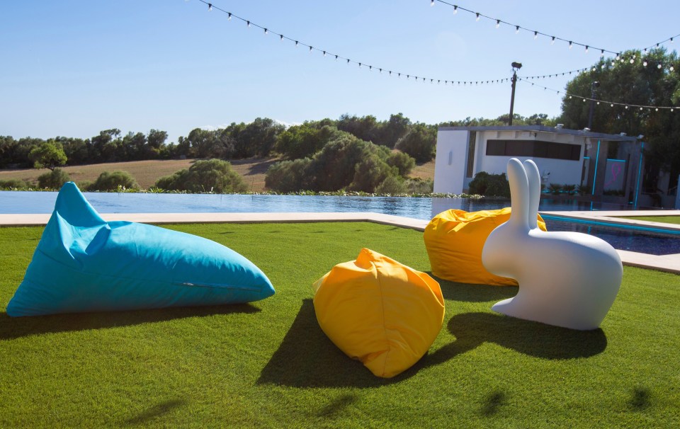 There's another large rabbit and some beanbags beside the swimming pool