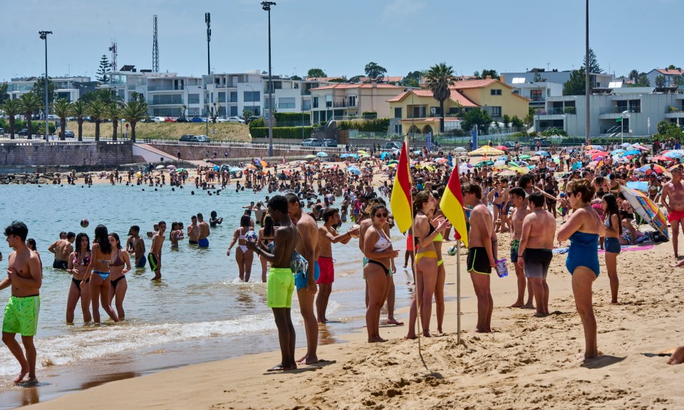 Portugal beaches are also packed with tourists despite being removed from the UK’s green list