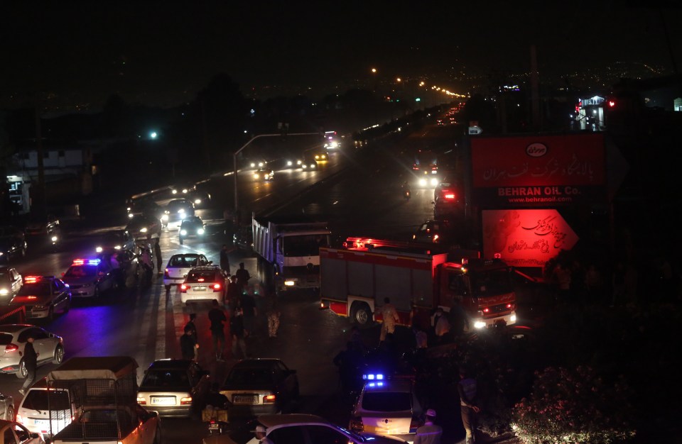 Firefighters and ambulances arrive at the Tondgooyan Oil Refinery