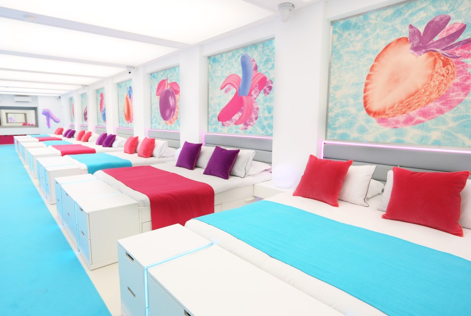 The long row of double beds, complete with fruity artworks, are back