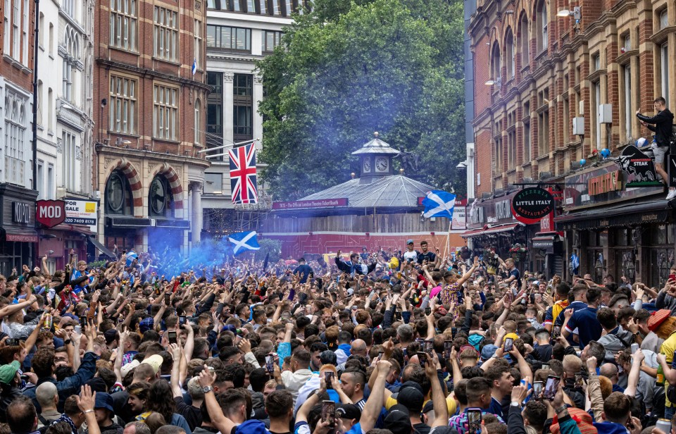 Fans squeezed into Leicester Square ahead of the match