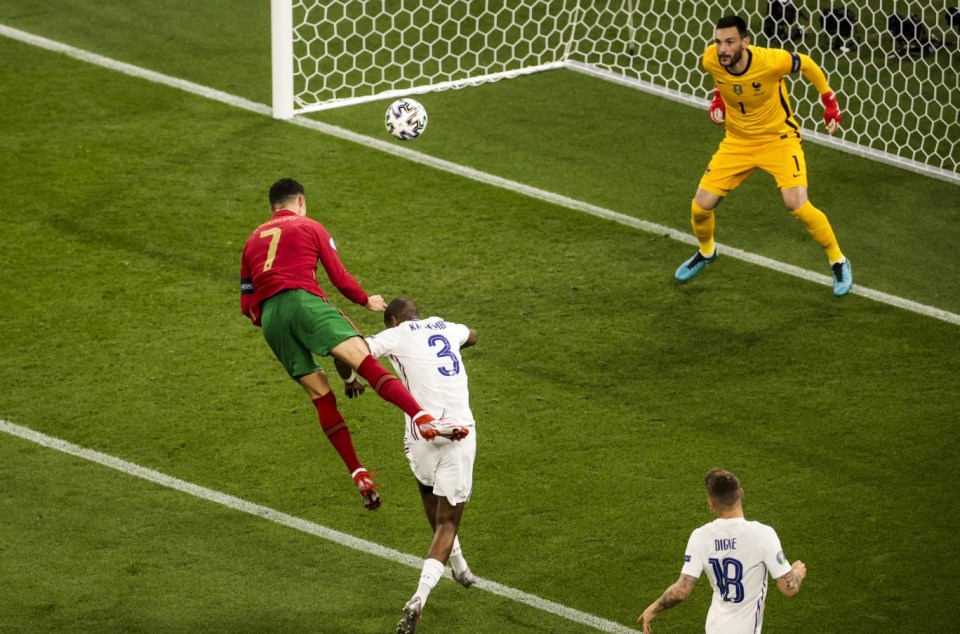 Cristiano Ronaldo dominates France defender Presnel Kimpembe with his jump