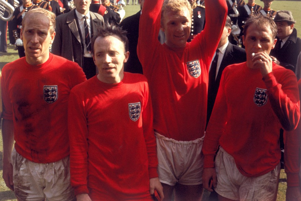 Bobby Charlton, left, and Nobby Stiles, second left, celebrate with Bobby Moore and Ray Wilson