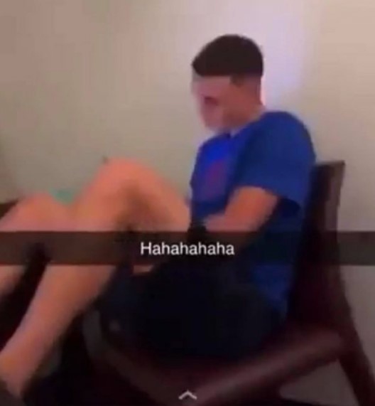 Phil Foden snapped inside the England hotel by one of the visiting girls