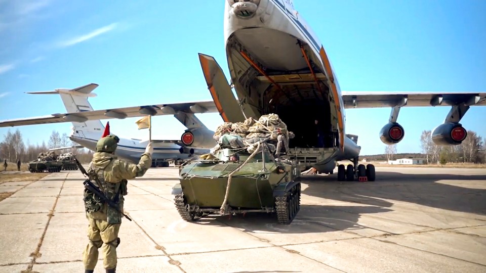 A Russian military vehicle preparing to be loaded into a plane for drills in Crimea