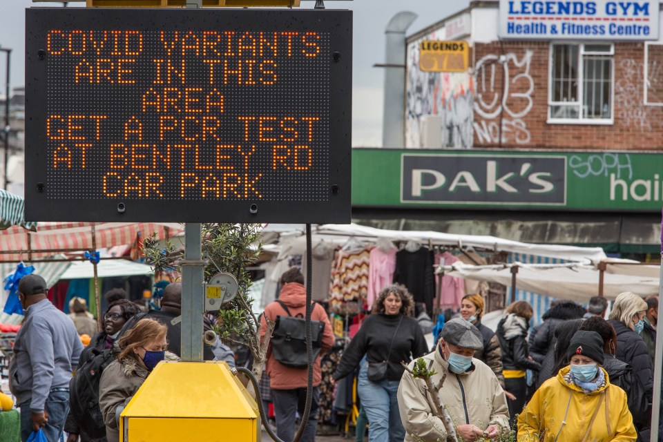 A Covid-19 sign at Ridley Road Market in Dalston, east London