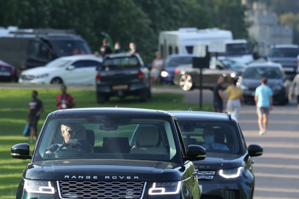 The Duke of York, with airpods in his ears, went by virtually unnoticed in his Range Rover after cops turned up