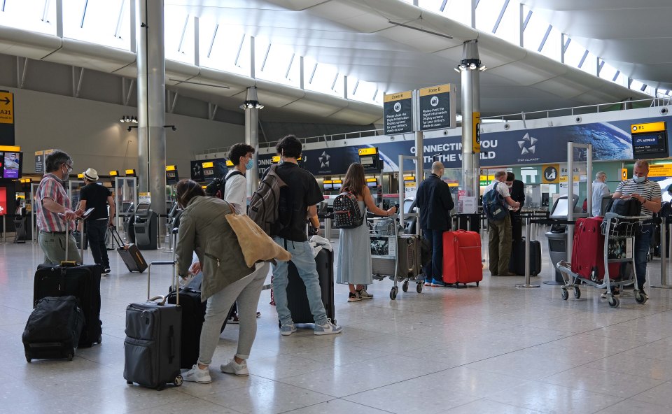 Passengers at Heathrow Airport today amid changes to the traffic light system